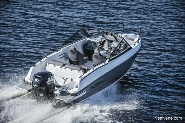 A motorboat named Falcon 545 speeds across the water, driven by a man wearing a gray cap, creating a spray of waves.